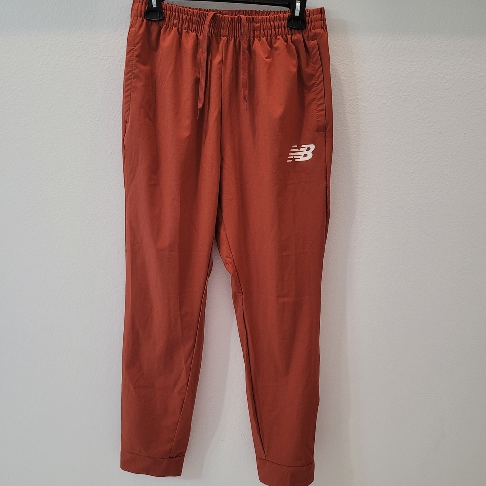 New Balance all motion 4 way stretch women jogger pants Size M Rust Color